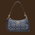 Coach “Denim Teri” Shoulder Bag